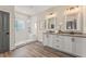 Elegant bathroom with double sinks, a large shower, and modern finishes at 945 Willingham Dr # 3, Hapeville, GA 30354