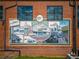 Historic Hapeville mural depicting the town's rich history and evolution through the years at 945 Willingham Dr # 3, Hapeville, GA 30354