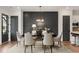 Elegant dining room with dark-gray wall and chandelier at 947 Willingham Dr # 2, Hapeville, GA 30354