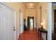 Spacious hallway with hardwood floors and neutral walls at 705 Springer Mountain Dr, Canton, GA 30114