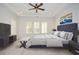 Spacious main bedroom with large windows and a plush bed at 705 Springer Mountain Dr, Canton, GA 30114