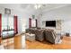 Spacious living area with hardwood floors and multiple seating options at 140 Wisteria Blvd, Covington, GA 30016