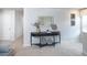 Stylish loft area with console table and mirror at 12000 Conrad, Hampton, GA 30228