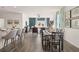 Open dining area with hardwood floors and view to the kitchen at 12000 Conrad, Hampton, GA 30228