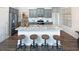 Kitchen island with granite countertop and seating for four at 12000 Conrad, Hampton, GA 30228