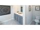 Elegant bathroom with double vanity and separate toilet area at 12000 Conrad, Hampton, GA 30228