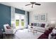 Bright living room with French doors leading to backyard access at 12000 Conrad, Hampton, GA 30228