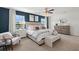 Main bedroom with a king-size bed, large windows, and a dresser at 12000 Conrad, Hampton, GA 30228