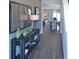 Bright entry with dark hardwood floors and view into the living and dining areas at 12000 Conrad, Hampton, GA 30228