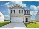 Two story house with two car garage at 12000 Conrad, Hampton, GA 30228