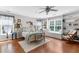 Bright bedroom with hardwood floors, built-in shelves and window seat at 1928 Main Nw St, Atlanta, GA 30318