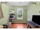 Large closet with shelving, hanging rods, and a window at 1928 Main Nw St, Atlanta, GA 30318