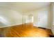 Living room with hardwood floors and access to other rooms at 153 Hood Cir, Decatur, GA 30030