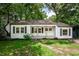 Charming white house with a porch at 153 Hood Cir, Decatur, GA 30030