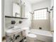 Clean bathroom with a tub, toilet and sink at 153 Hood Cir, Decatur, GA 30030