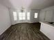 Bright dining area with chandelier and wood-look flooring at 2794 Norfair Loop, Lithonia, GA 30038