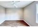 Primary bedroom with ceiling fan and wood flooring at 79 Hammock Pl, Atlanta, GA 30312