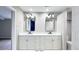 Primary bathroom with a double vanity and modern finishes at 79 Hammock Pl, Atlanta, GA 30312