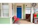 Back porch with blue door and red stadium seats at 79 Hammock Pl, Atlanta, GA 30312