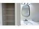 Bathroom with a vanity, storage, and modern mirror at 79 Hammock Pl, Atlanta, GA 30312