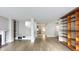 Open living area with hardwood floors, fireplace, and built-in shelves at 79 Hammock Pl, Atlanta, GA 30312