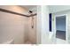 Spa-like shower with neutral tile and a built-in bench at 79 Hammock Pl, Atlanta, GA 30312
