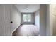 Bright bedroom with wood-look floors and ceiling fan at 79 Hammock Pl, Atlanta, GA 30312