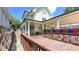 Wooden deck in the backyard with colorful railing at 79 Hammock Pl, Atlanta, GA 30312