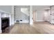 Living room with hardwood floors, fireplace, and built-in shelving at 79 Hammock Pl, Atlanta, GA 30312