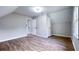 Spacious bedroom with wood-look floors and double doors at 79 Hammock Pl, Atlanta, GA 30312