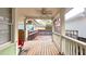Wooden back porch with ceiling fan and view of backyard at 79 Hammock Pl, Atlanta, GA 30312