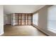 Bright living room featuring hardwood floors and large built-in shelves at 79 Hammock Pl, Atlanta, GA 30312