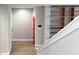 Bright entryway with red door and built-in shelves at 79 Hammock Pl, Atlanta, GA 30312