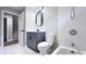 Bathroom features a vanity, toilet, and a bathtub at 79 Hammock Pl, Atlanta, GA 30312