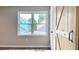 Primary bedroom with window and barn door at 79 Hammock Pl, Atlanta, GA 30312
