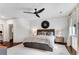 Large bedroom with king-size bed and ceiling fan at 6710 Center Grove St, Cumming, GA 30040