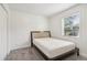 Small bedroom with a full-size bed and window at 750 Dalrymple Rd # C1, Atlanta, GA 30328