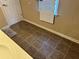 Simple bathroom with tile floor and a window at 1080 Meadow Walk Ave, Lawrenceville, GA 30044