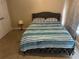Bedroom with carpeted floor and a comfortable bed at 1080 Meadow Walk Ave, Lawrenceville, GA 30044