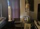 Bedroom with a tall fan and side tables at 1080 Meadow Walk Ave, Lawrenceville, GA 30044