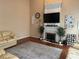Living room with a fireplace and hardwood floors at 1080 Meadow Walk Ave, Lawrenceville, GA 30044