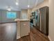 Modern kitchen with stainless steel appliances and breakfast bar at 6246 Rockaway Rd, Atlanta, GA 30349