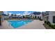 Community pool with surrounding seating and landscaping at 3701 Allegretto Cir, Atlanta, GA 30339