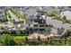 Aerial view of community featuring townhouses and a central courtyard with a patio and grill at 3701 Allegretto Cir, Atlanta, GA 30339