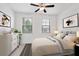 Comfortable bedroom with a queen-size bed and striped bedding at 3701 Allegretto Cir, Atlanta, GA 30339