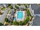 Community pool with surrounding lounge chairs and landscaping at 3701 Allegretto Cir, Atlanta, GA 30339