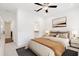 Bright bedroom with a queen-size bed, ensuite bathroom access, and neutral decor at 3701 Allegretto Cir, Atlanta, GA 30339