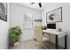 Home office with a desk, chair, and ample natural light at 3701 Allegretto Cir, Atlanta, GA 30339