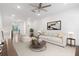 Spacious living room with hardwood floors, a neutral color palette, and a modern aesthetic at 3701 Allegretto Cir, Atlanta, GA 30339