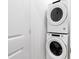 Laundry room with stackable washer and dryer at 3701 Allegretto Cir, Atlanta, GA 30339